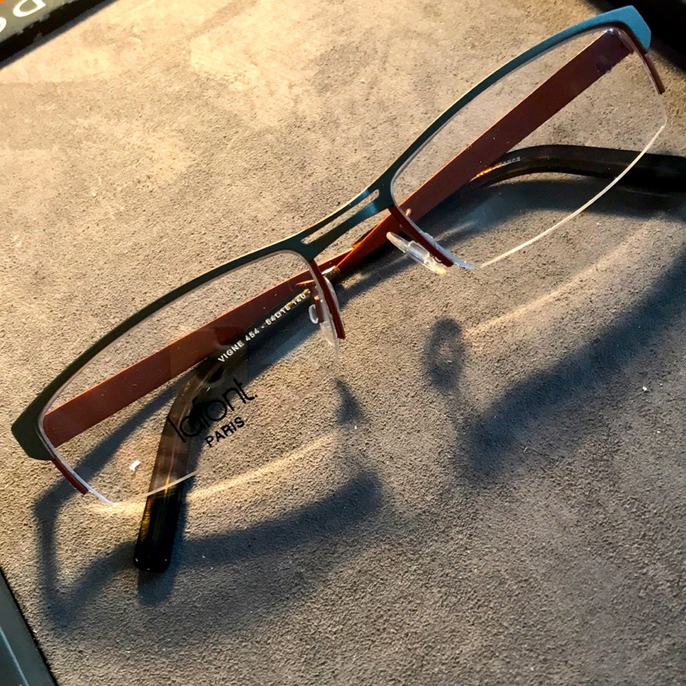 Lafont Vigne 464  54/18/140 olive face w copper orange arms.  Never owned.